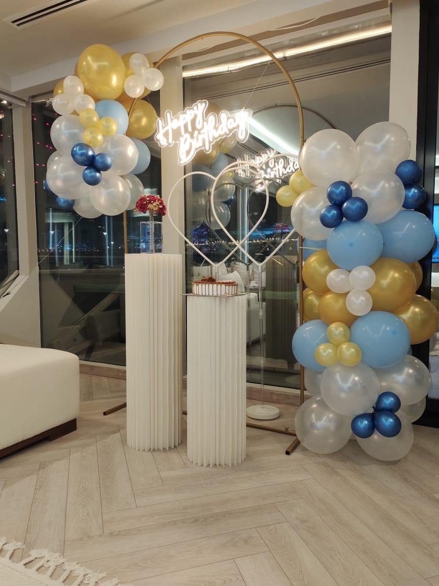 Blue and white balloon arrangement